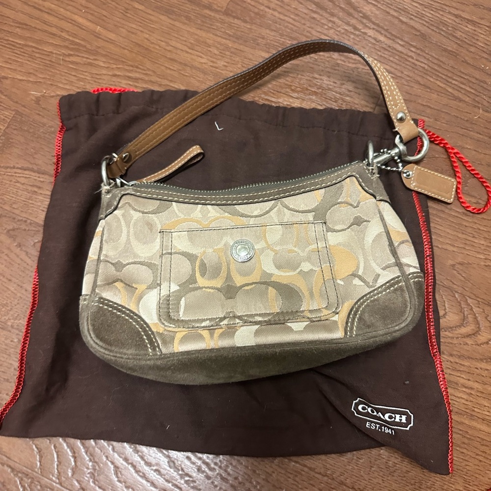 Small brown coach logo bag